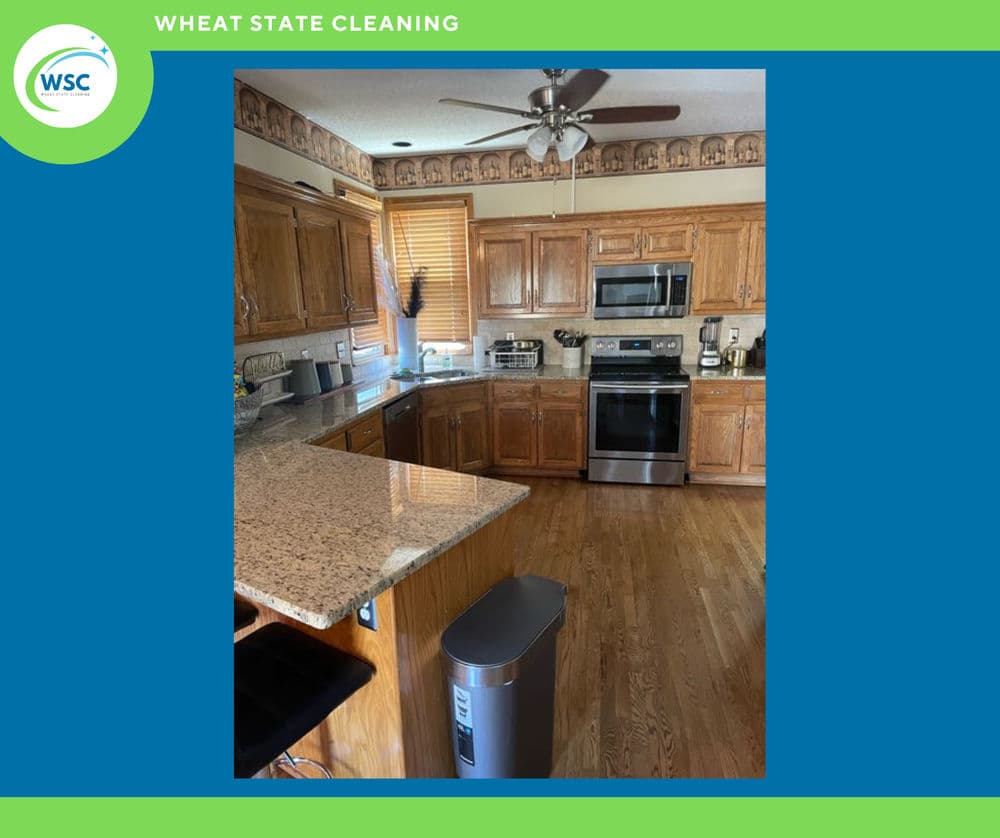 Modern kitchen with wooden cabinets, granite countertops, and stainless steel appliances.