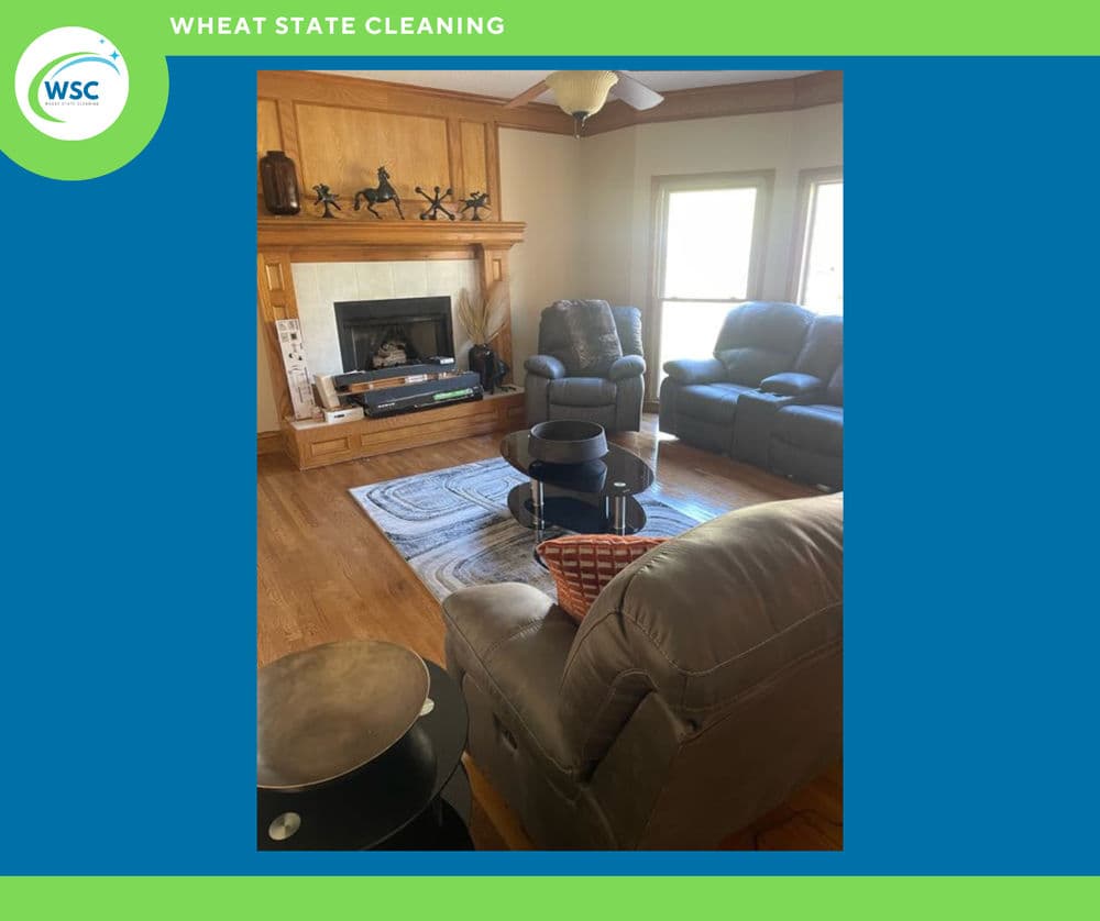 Living room with leather recliners, coffee table, and fireplace in a cozy setting.