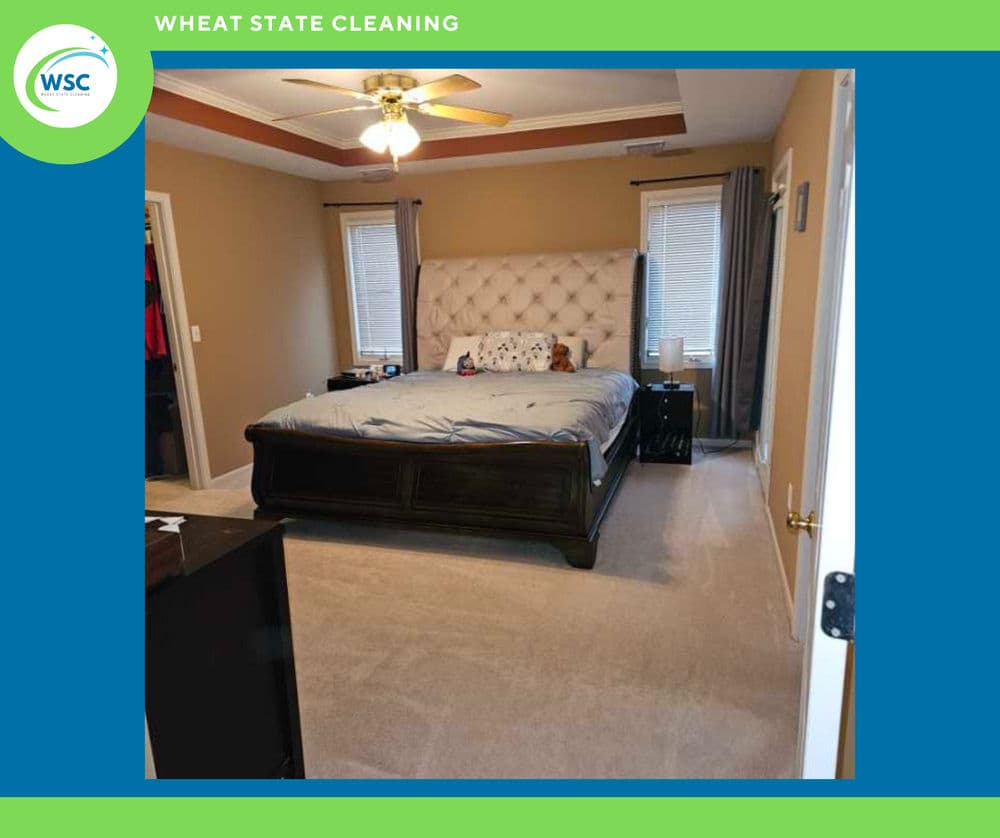 Modern bedroom with large bed, natural light, and neutral decor. Clean and spacious interior.